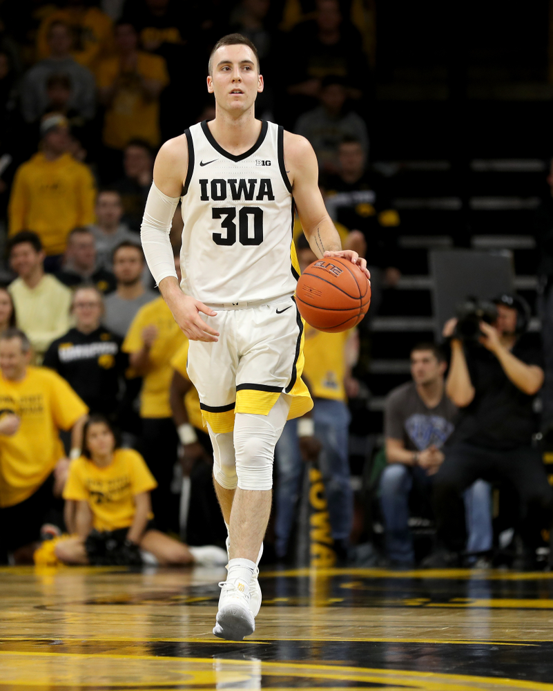 Iowa Hawkeyes guard Connor McCaffery (30) Iowa Hawkeyes guard CJ Fredrick (5) against the Michigan Wolverines Friday, January 17, 2020 at Carver-Hawkeye Arena. (Brian Ray/hawkeyesports.com)