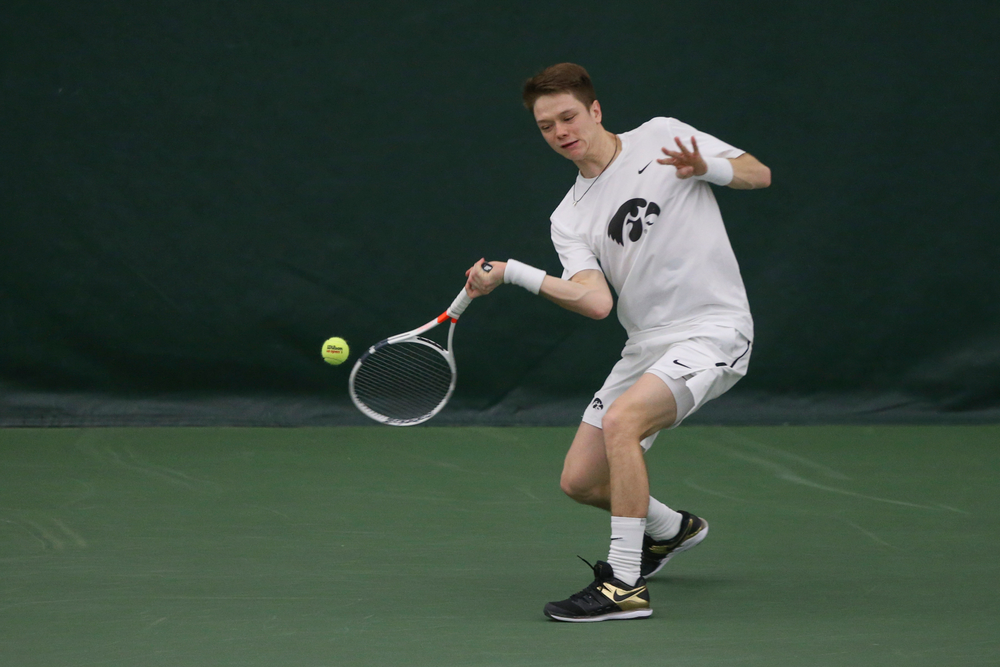 Iowa’s Jason Kerst returns a hit during the Iowa men’s tennis meet vs Nebraska on Sunday, March 1, 2020 at the Hawkeye Tennis and Recreation Complex. (Lily Smith/hawkeyesports.com)