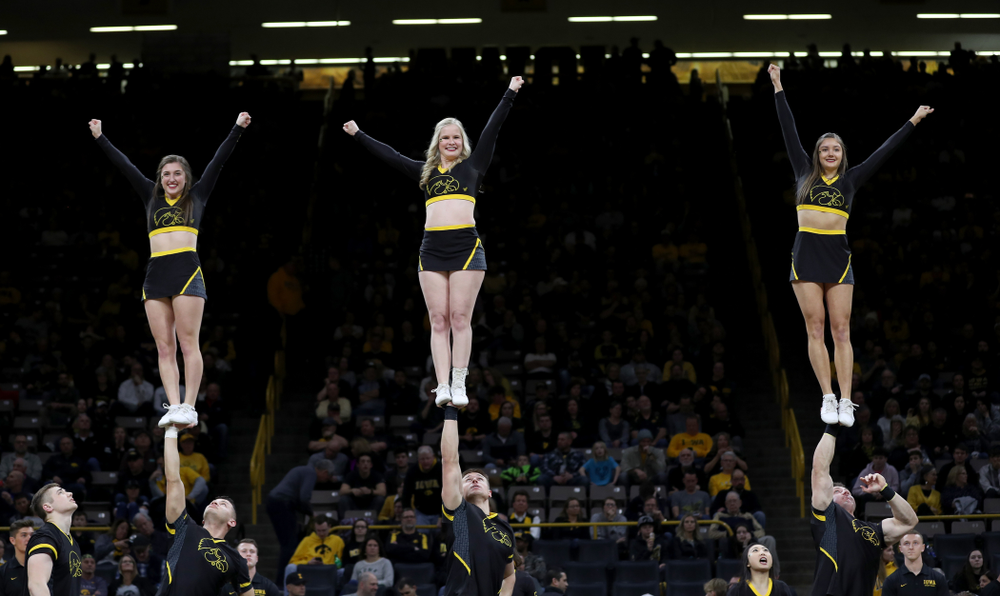 The Iowa Cheerleaders and Dance Team perform on senior night at half-time of the Iowa Hawkeyes game against the Purdue Boilermakers Tuesday, March 3, 2020 at Carver-Hawkeye Arena. (Brian Ray/hawkeyesports.com)