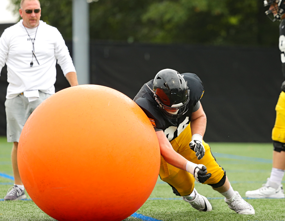 Iowa Hawkeyes offensive lineman Ezra Miller (76) runs a drill durning Fall Camp Practice No. 17 at the Hansen Football Performance Center in Iowa City on Wednesday, Aug 21, 2019. (Stephen Mally/hawkeyesports.com)