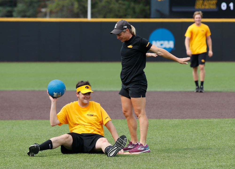 Head Women's Golf Coach Megan Menzel and Asst. Director Compliance Henry Archuleta during the Iowa Student Athlete Kickoff Kickball game Sunday, August 19, 2018 at Duane Banks Field. (Brian Ray/hawkeyesports.com)