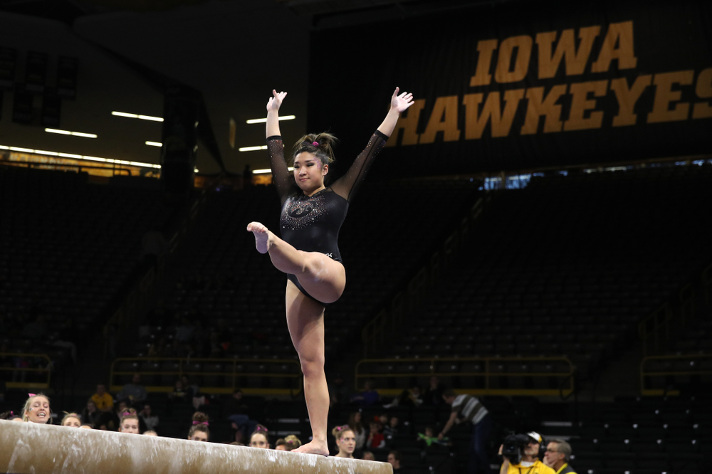 Iowa's Nicole Chow competes on the beam during their meet against the Minnesota Golden Gophers Saturday, January 19, 2019 at Carver-Hawkeye Arena. (Brian Ray/hawkeyesports.com)