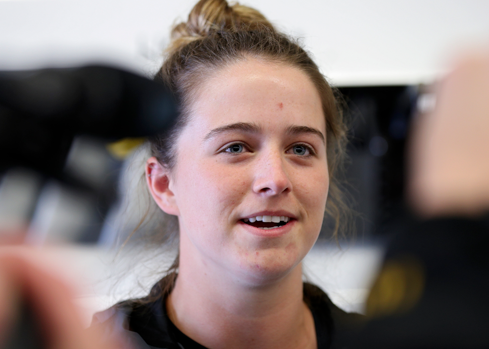 Iowa's Noelle Ossenkop answers a question during media availability at the P. Sue Beckwith, M.D., Boathouse in Iowa City on Wednesday, Apr. 10, 2019. (Stephen Mally/hawkeyesports.com)