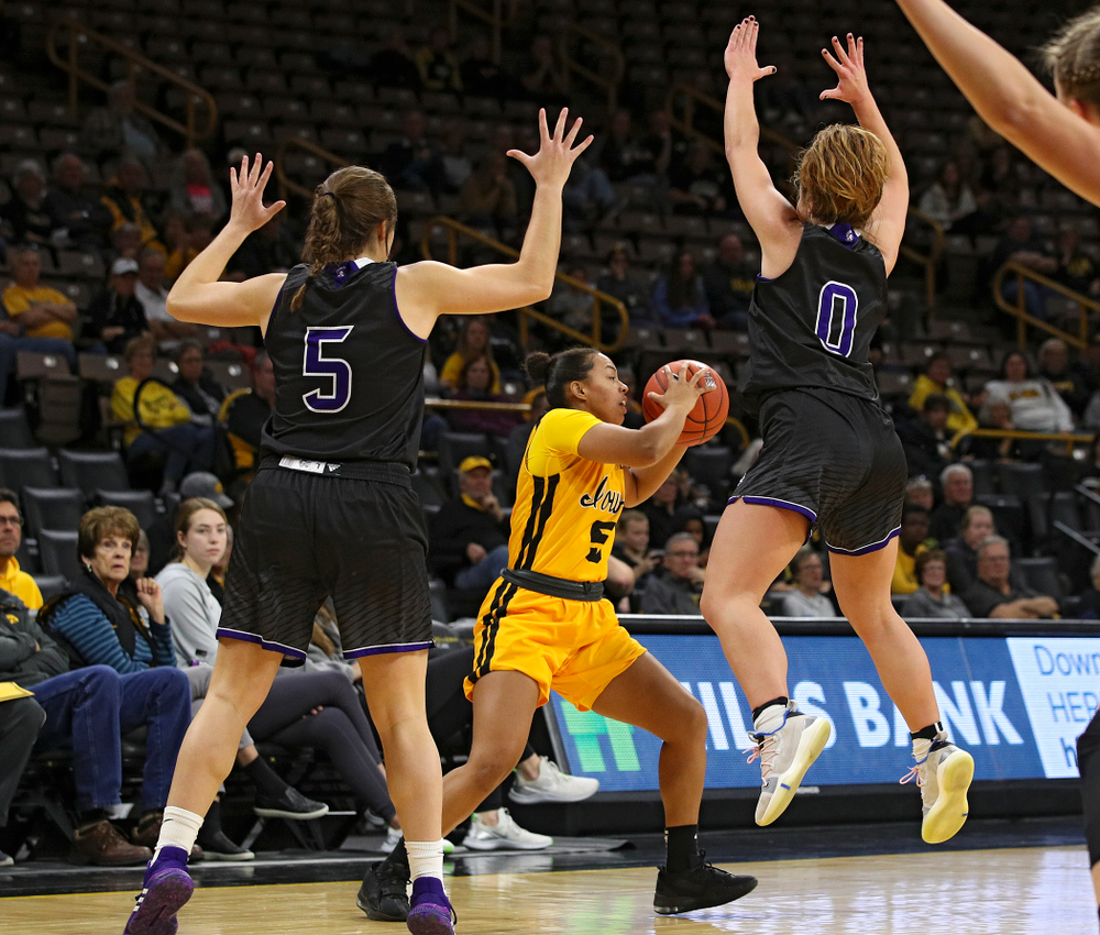 Iowa guard Alexis Sevillian (5) looks to pass during the third quarter of their game against Winona State at Carver-Hawkeye Arena in Iowa City on Sunday, Nov 3, 2019. (Stephen Mally/hawkeyesports.com)