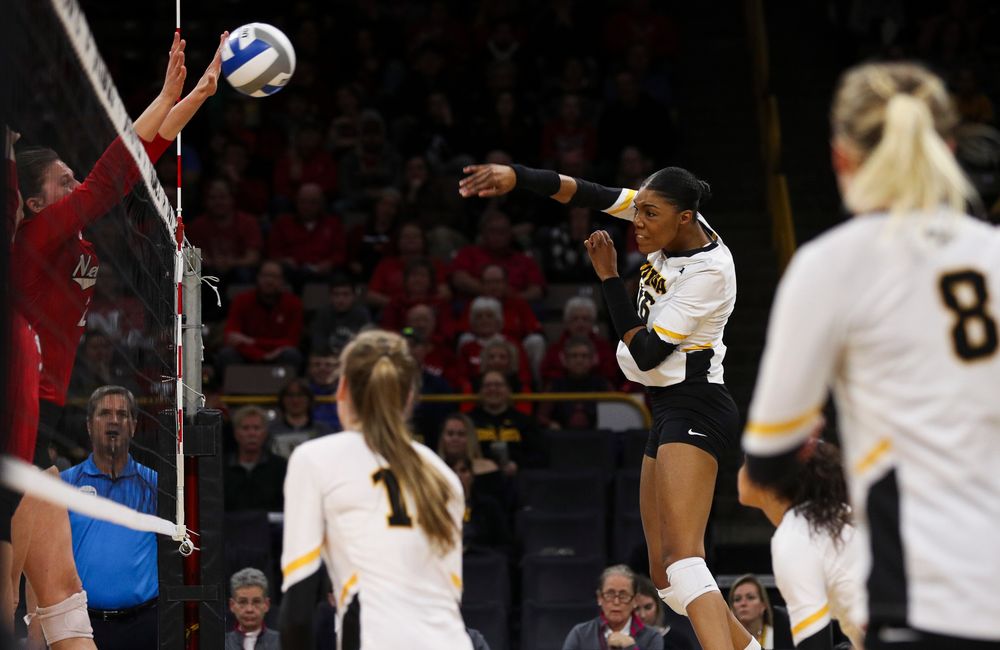 Iowa Hawkeyes outside hitter Taylor Louis (16) spikes the ball during a match against Nebraska at Carver-Hawkeye Arena on November 7, 2018. (Tork Mason/hawkeyesports.com)