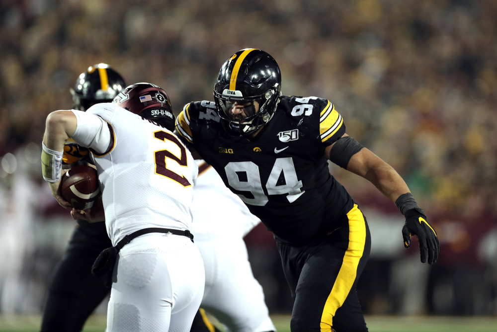 Iowa Hawkeyes defensive end A.J. Epenesa (94) records a sack against the Minnesota Golden Gophers Saturday, November 16, 2019 at Kinnick Stadium. (Brian Ray/hawkeyesports.com)