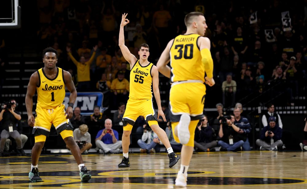 Iowa Hawkeyes forward Luka Garza (55) celebrates a three point basket against the Nebraska Cornhuskers Saturday, February 8, 2020 at Carver-Hawkeye Arena. (Brian Ray/hawkeyesports.com)