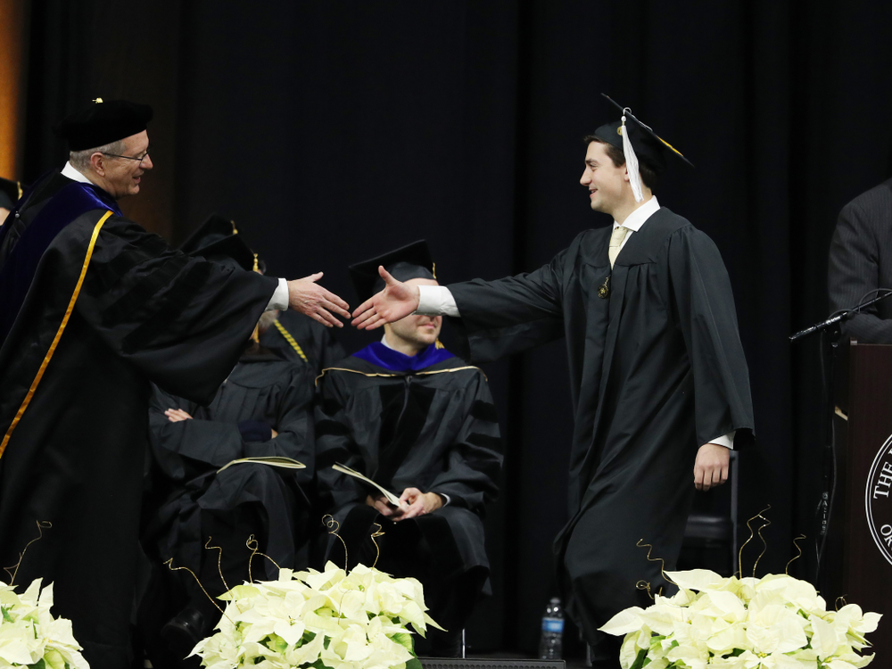 Iowa Football Manager Brandon Thielen during the Fall Commencement Ceremony Saturday, December 15, 2018 at Carver-Hawkeye Arena. (Brian Ray/hawkeyesports.com)