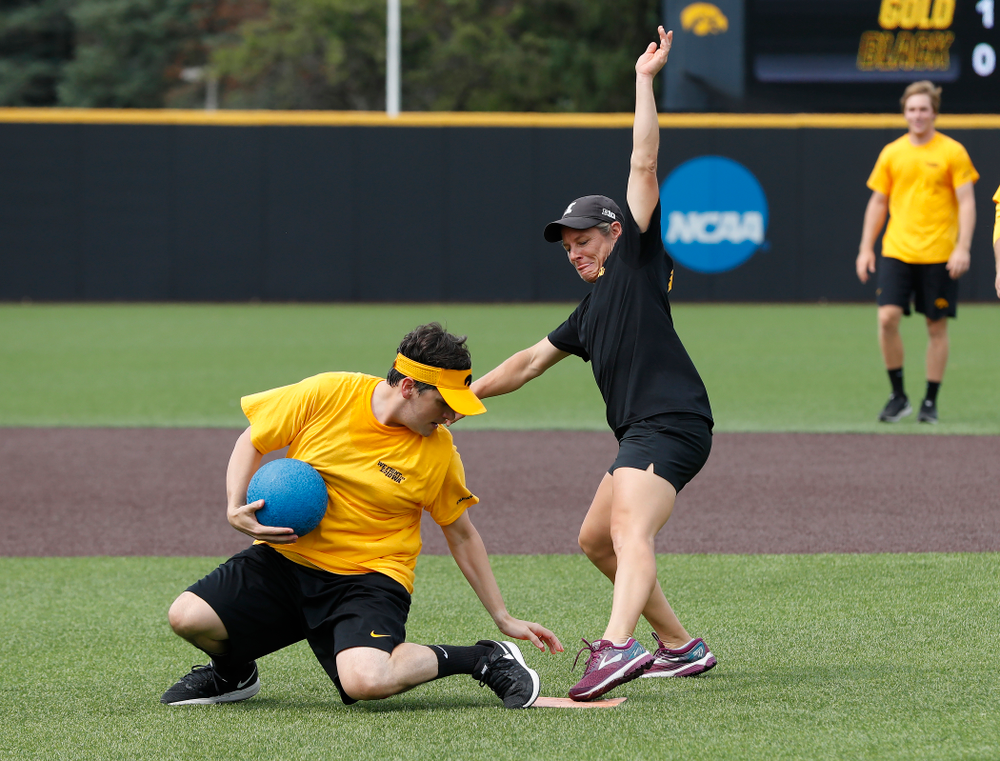 Head Women's Golf Coach Megan Menzel and Asst. Director Compliance Henry Archuleta during the Iowa Student Athlete Kickoff Kickball game Sunday, August 19, 2018 at Duane Banks Field. (Brian Ray/hawkeyesports.com)