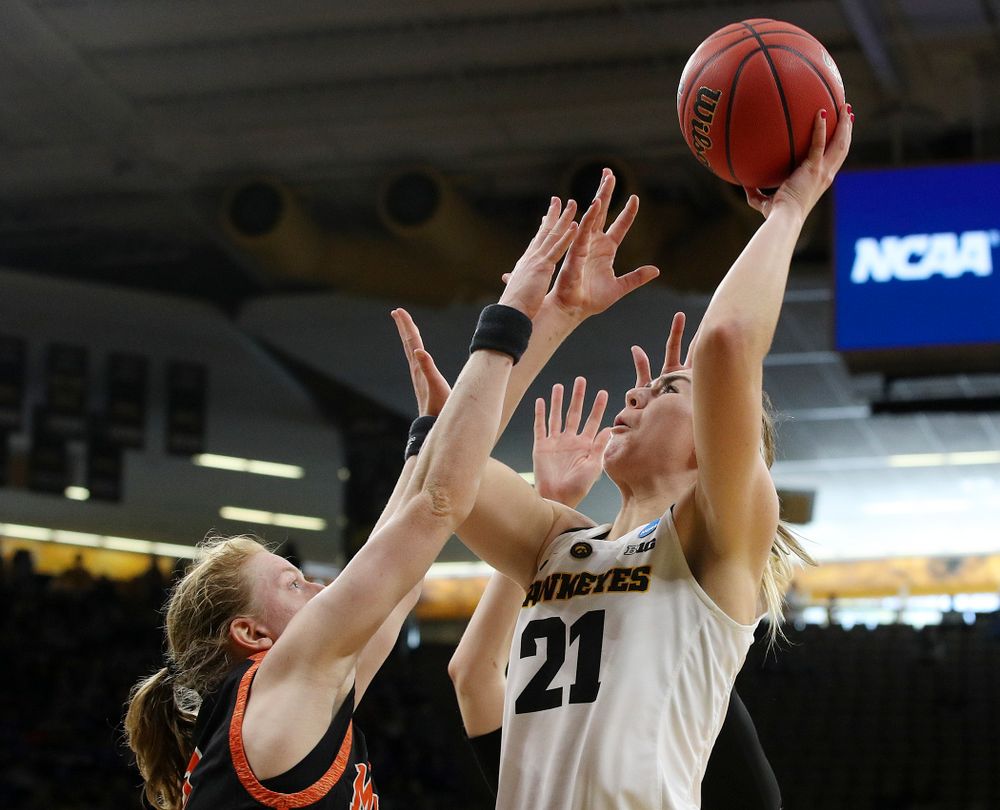 Iowa Hawkeyes forward Hannah Stewart (21) shoots during the first round of the 2019 NCAA Women's Basketball Tournament at Carver Hawkeye Arena in Iowa City on Friday, Mar. 22, 2019. (Stephen Mally for hawkeyesports.com)