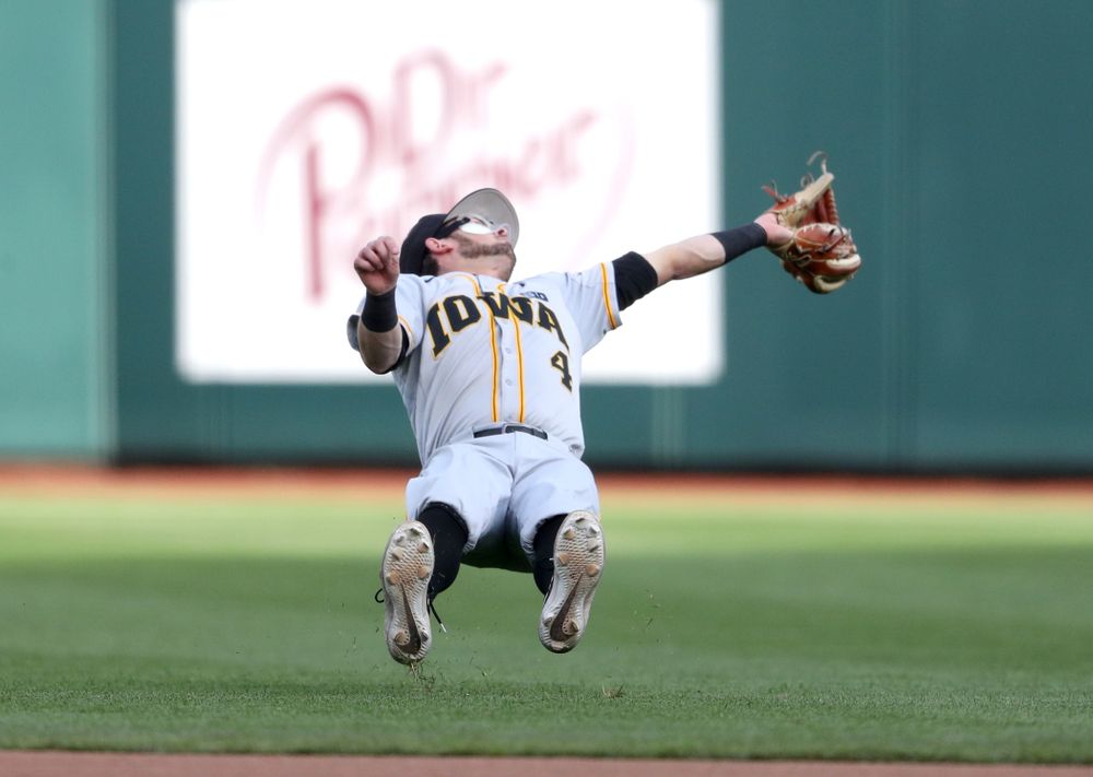 Iowa Hawkeyes infielder Mitchell Boe (4) catches a fly ball against the Indiana Hoosiers in the first round of the Big Ten Baseball Tournament Wednesday, May 22, 2019 at TD Ameritrade Park in Omaha, Neb. (Brian Ray/hawkeyesports.com)