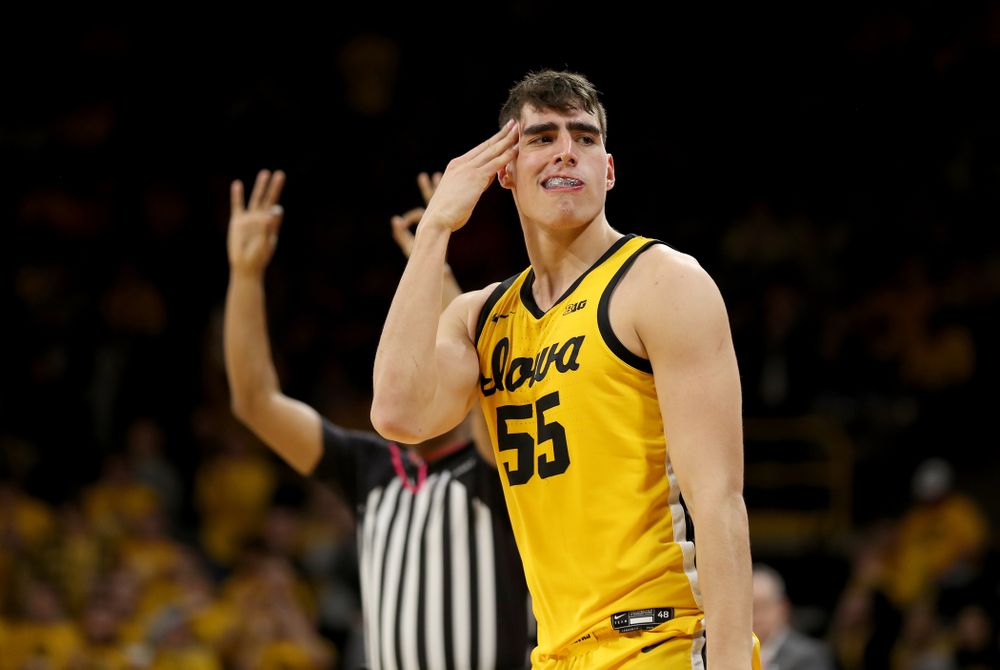 Iowa Hawkeyes forward Luka Garza (55) celebrates a three point basket against the Rutgers Scarlet Knights Wednesday, January 22, 2020 at Carver-Hawkeye Arena. (Brian Ray/hawkeyesports.com)