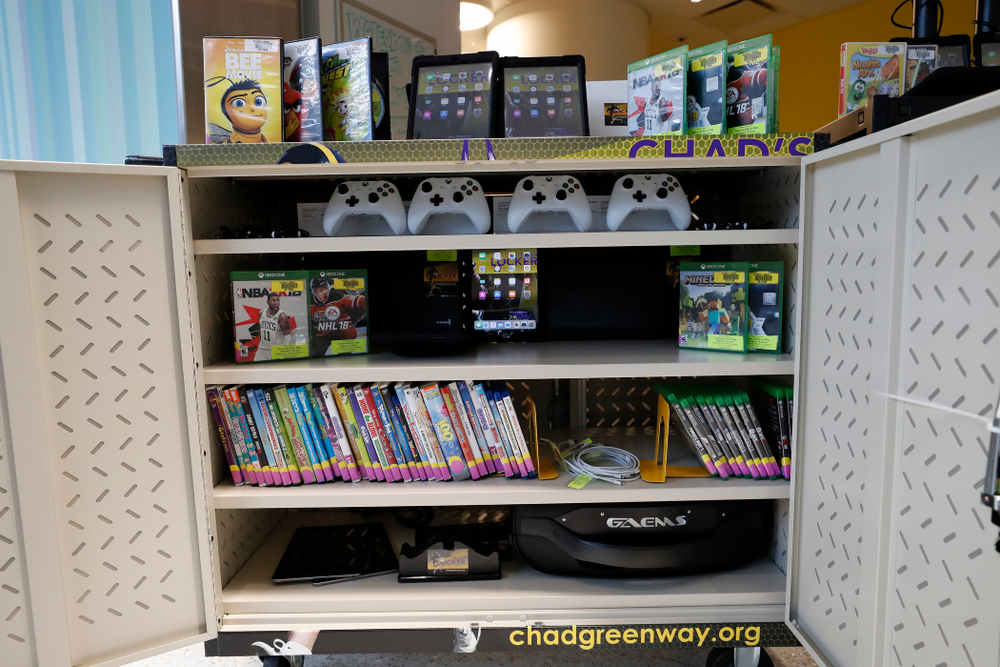 Former Hawkeye Football linebacker Chad Greenway's Lead the Way Foundation unveils their latest Greenway's Locker technology and media cabinet Friday, August 31, 2018 at the University of Iowa Stead Family Children's Hospital. Chad's Locker provides patients and their families access to notebook computers, movies and video game systems to occupy their time during their hospital stay. (Brian Ray/hawkeyesports.com)