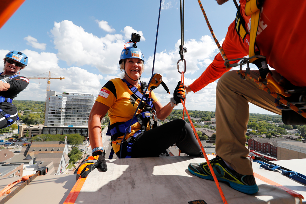 Iowa Women's Basketball head coach Lisa Bluder goes Over The Edge to benefit Ronald McDonald House Charities of Eastern Iowa and Western Illinois Friday, September 14, 2018 in downtown Iowa City.(Brian Ray/hawkeyesports.com)
