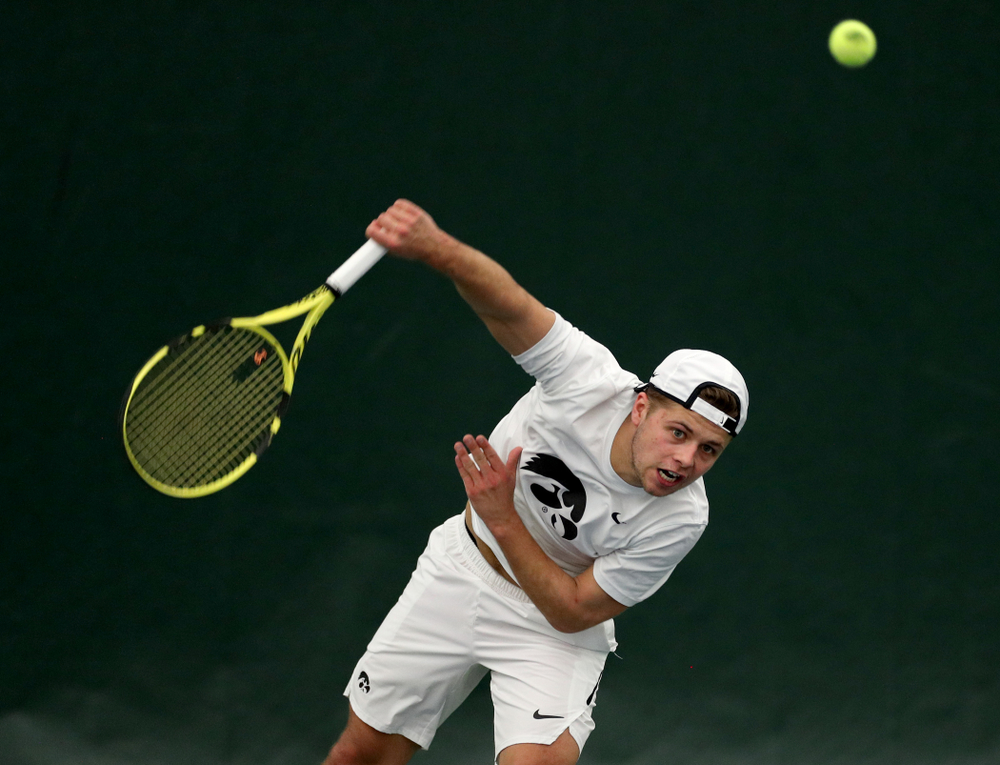 Iowa’s Will Davies against Cornell Sunday, March 8, 2020 at the Hawkeye Tennis and Recreation Center. (Brian Ray/hawkeyesports.com)