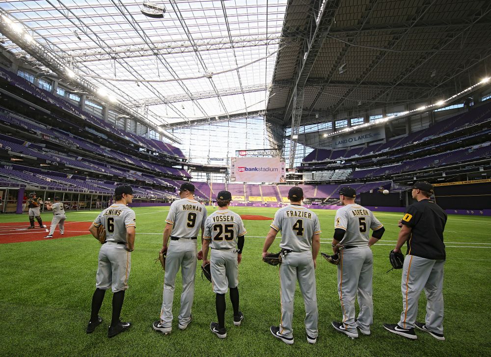 Iowa Hawkeyes outfielder Justin Jenkins (6), outfielder Ben Norman (9), outfielder Paul Vossen (25), infielder/catcher Brayden Frazier (4), outfielder/first baseman Zeb Adreon (5), and pitcher Jack Guzek (40) look on before their CambriaCollegeClassic game at U.S. Bank Stadium in Minneapolis, Minn. on Friday, February 28, 2020. (Stephen Mally/hawkeyesports.com)