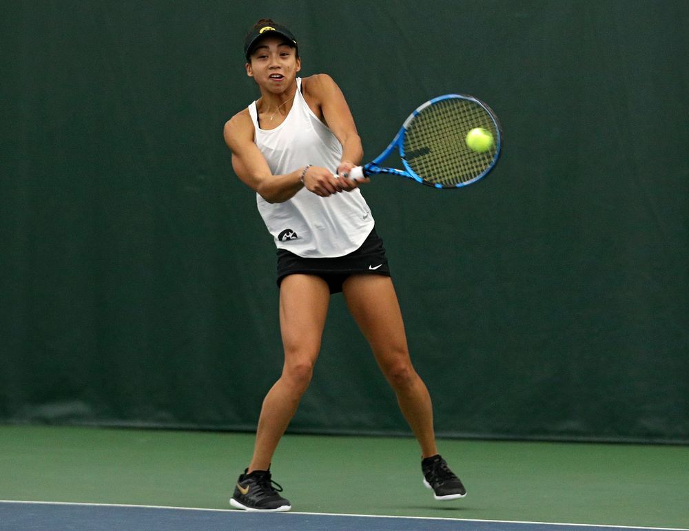 Iowa’s Michelle Bacalla returns a shot during her singles match at the Hawkeye Tennis and Recreation Complex in Iowa City on Sunday, February 23, 2020. (Stephen Mally/hawkeyesports.com)