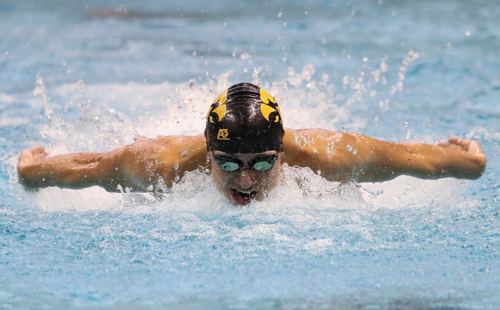 Iowa's Michael Tenney competes in the 100-yard butterfly during a meet against Michigan and Denver at the Campus Recreation and Wellness Center on November 3, 2018. (Tork Mason/hawkeyesports.com)