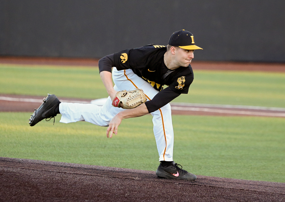 Iowa pitcher Cam Baumann (35) delivers to the plate during the fourth inning of their game at Duane Banks Field in Iowa City on Tuesday, March 3, 2020. (Stephen Mally/hawkeyesports.com)