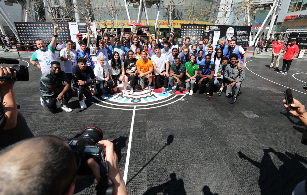 Iowa Hawkeyes forward Megan Gustafson (10) with the other ESPN College Basketball Awards honorees during a Special Olympics event Friday, April 12, 2019 as part of the ESPN College Basketball Awards in the XBOX Plaza at LA Live. (Brian Ray/hawkeyesports.com)