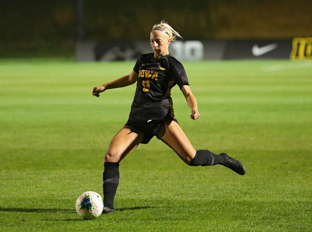 Iowa defender Samantha Cary (9) lines up a shot during the first half of their match against Illinois at the Iowa Soccer Complex in Iowa City on Thursday, Sep 26, 2019. (Stephen Mally/hawkeyesports.com)