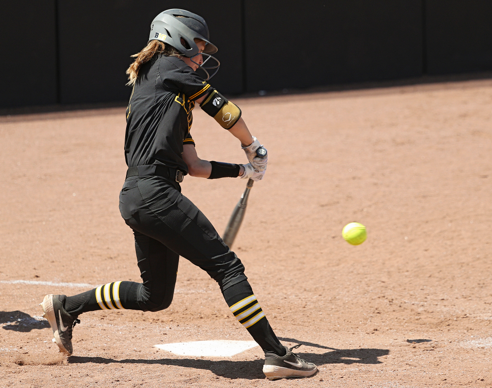 Iowa second baseman Aralee Bogar (2) drives a pitch for a hit during the third inning of their game against Ohio State at Pearl Field in Iowa City on Saturday, May. 4, 2019. (Stephen Mally/hawkeyesports.com)