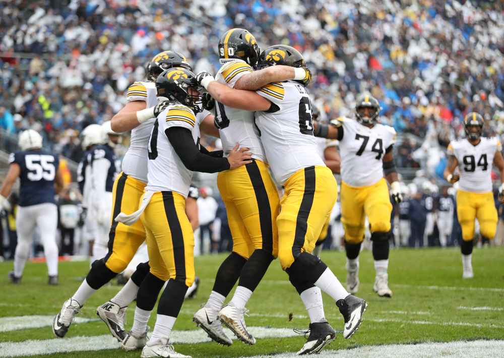 Iowa Hawkeyes defensive end Sam Brincks (90) catches a touchdown pass against the Penn State Nittany Lions Saturday, October 27, 2018 at Beaver Stadium in University Park, Pa. (Max Allen/hawkeyesports.com)