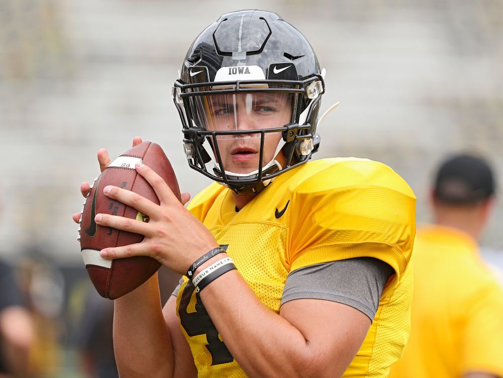 Iowa Hawkeyes quarterback Nate Stanley (4) looks to throw during Fall Camp Practice No. 8 at Kids Day at Kinnick Stadium in Iowa City on Saturday, Aug 10, 2019. (Stephen Mally/hawkeyesports.com)