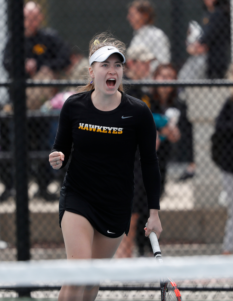 Elise Van Heuvelen and Anastasia Reimchen play a doubles match against the Wisconsin Badgers Sunday, April 22, 2018 at the Hawkeye Tennis and Recreation Center. (Brian Ray/hawkeyesports.com)