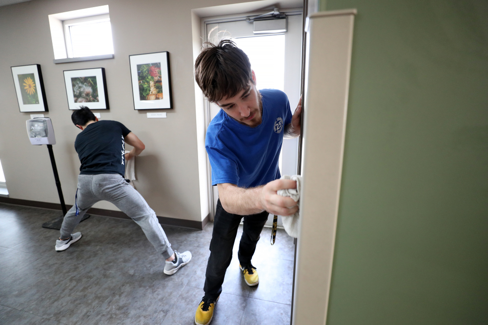 Members of the MenÕs Gymnastics team volunteer at CommUnity Crisis Services and Food Bank during the annual Iowa Athletics Day of Caring Sunday, April 28, 2019 in Iowa City. (Brian Ray/hawkeyesports.com)