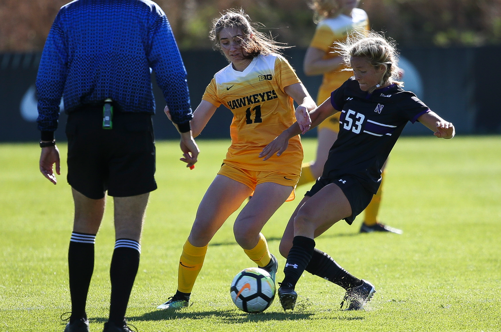 Iowa Hawkeyes midfielder Sydney Blitchok (11) dribbles the ball during a game against Northwestern at the Iowa Soccer Complex on October 21, 2018. (Tork Mason/hawkeyesports.com)