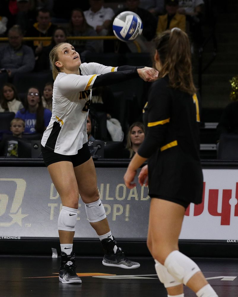 Iowa Hawkeyes right side hitter Reghan Coyle (8) bumps the ball during a match against Rutgers at Carver-Hawkeye Arena on November 2, 2018. (Tork Mason/hawkeyesports.com)