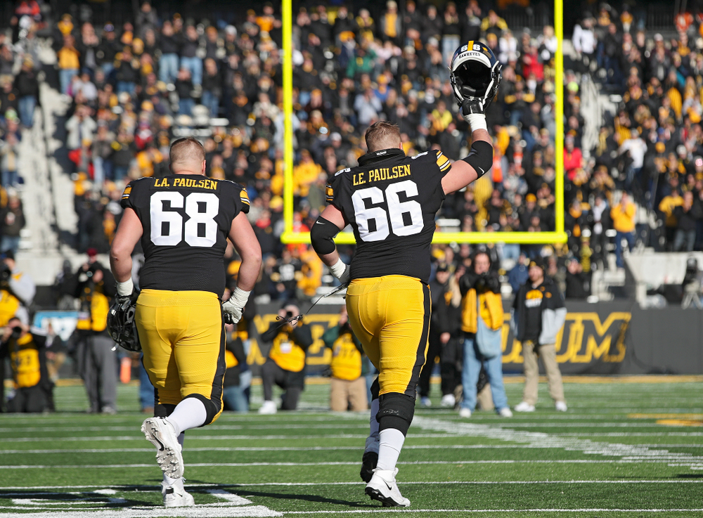 Iowa Hawkeyes offensive lineman Landan Paulsen (68) and offensive lineman Levi Paulsen (66) are acknowledged on senior day before their game at Kinnick Stadium in Iowa City on Saturday, Nov 23, 2019. (Stephen Mally/hawkeyesports.com)