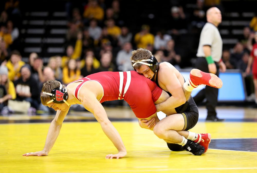 IowaÕs Spencer Lee wrestles WisconsinÕs Michael Cullen at 125 pounds Sunday, December 1, 2019 at Carver-Hawkeye Arena. Lee won the match with a 16-0 technical fall. (Brian Ray/hawkeyesports.com)