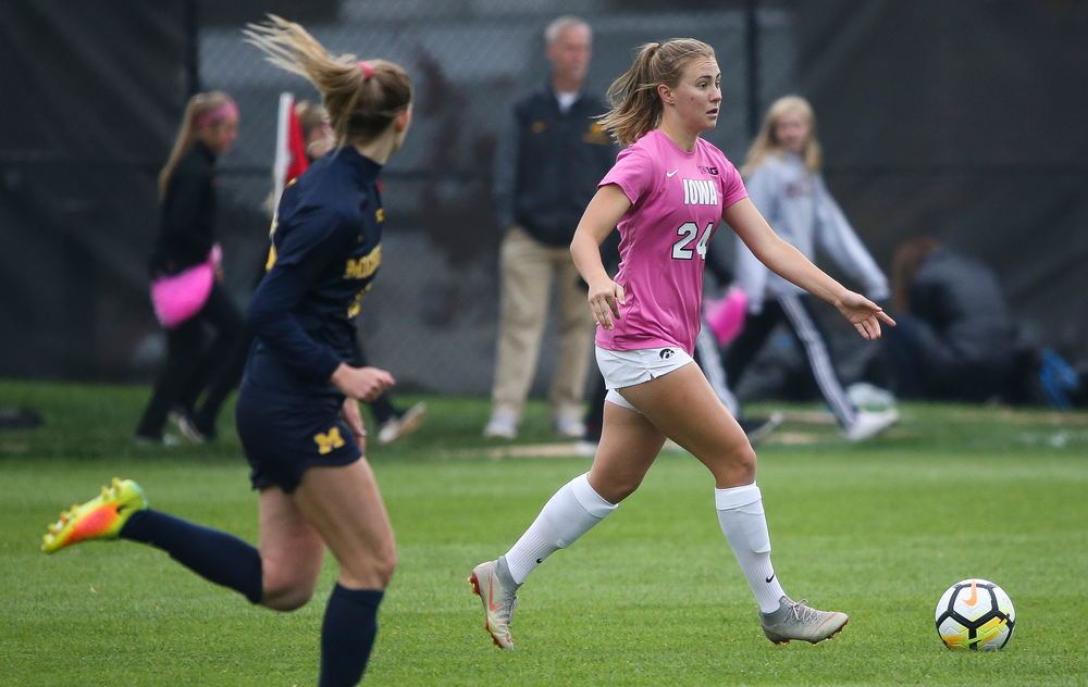 Iowa Hawkeyes defender Sara Wheaton (24) dribbles the ball during a game against Michigan at the Iowa Soccer Complex on October 14, 2018. (Tork Mason/hawkeyesports.com)