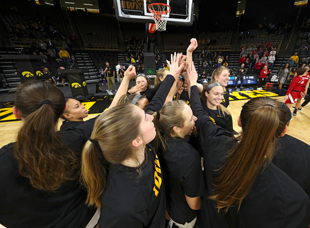 The Hawkeyes huddle before the game at Carver-Hawkeye Arena in Iowa City on Thursday, February 6, 2020. (Stephen Mally/hawkeyesports.com)