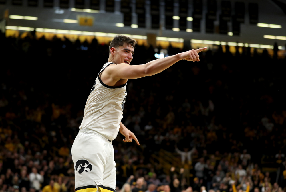 Iowa Hawkeyes forward Luka Garza (55) reacts after a dunk against Penn State Saturday, February 29, 2020 at Carver-Hawkeye Arena. (Brian Ray/hawkeyesports.com)