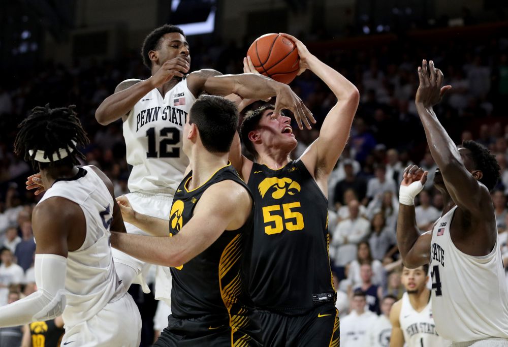 Iowa Hawkeyes forward Luka Garza (55) draws a foul against Penn State Saturday, January 4, 2020 at the Palestra in Philadelphia. (Brian Ray/hawkeyesports.com)