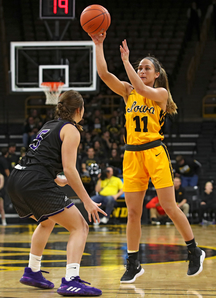 Iowa guard Megan Meyer (11) passes the ball during the fourth quarter of their game against Winona State at Carver-Hawkeye Arena in Iowa City on Sunday, Nov 3, 2019. (Stephen Mally/hawkeyesports.com)