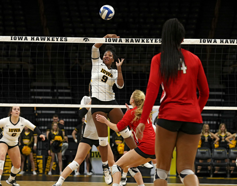 Iowa’s Amiya Jones (9) with a kill during the first set of their match at Carver-Hawkeye Arena in Iowa City on Saturday, Nov 30, 2019. (Stephen Mally/hawkeyesports.com)