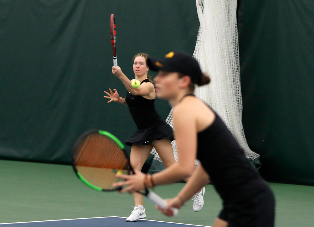 Elise Van Heuvelen and Anastasia Reimchen play a doubles match against Ohio State Sunday, March 25, 2018 at the Hawkeye Tennis and Recreation Center. (Brian Ray/hawkeyesports.com)