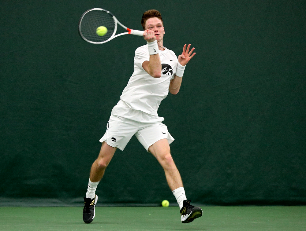 Iowa’s Jason Kerst returns a shot during his singles match at the Hawkeye Tennis and Recreation Complex in Iowa City on Sunday, February 16, 2020. (Stephen Mally/hawkeyesports.com)
