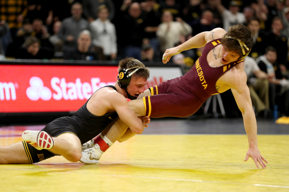 Iowa’s Max Murin wrestles Minnesota’s Mitch McKee at 141 pounds Saturday, February 15, 2020 at Carver-Hawkeye Arena. Murin won the match 6-4. (Brian Ray/hawkeyesports.com)