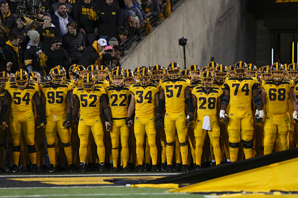 The Hawkeyes prepare to swarm the field before their game at Kinnick Stadium in Iowa City on Saturday, Oct 12, 2019. (Stephen Mally/hawkeyesports.com)