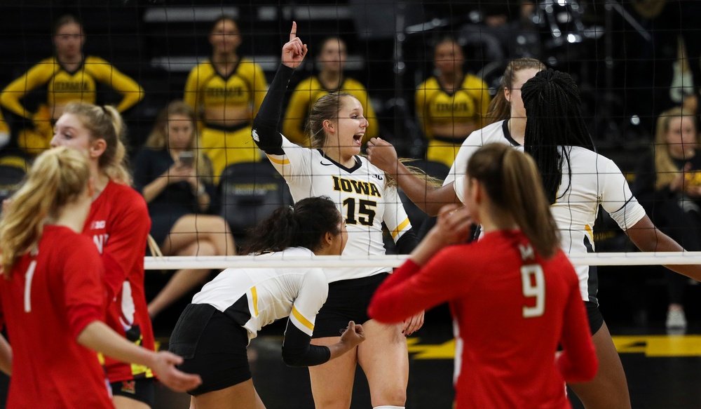 Iowa Hawkeyes defensive specialist Maddie Slagle (15) celebrates after winning a point during a match against Maryland at Carver-Hawkeye Arena on November 23, 2018. (Tork Mason/hawkeyesports.com)
