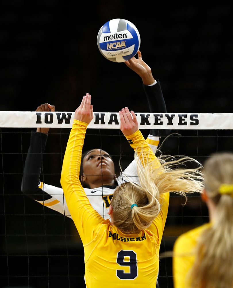 Iowa Hawkeyes outside hitter Taylor Louis (16) against the Michigan Wolverines Sunday, September 23, 2018 at Carver-Hawkeye Arena. (Brian Ray/hawkeyesports.com)