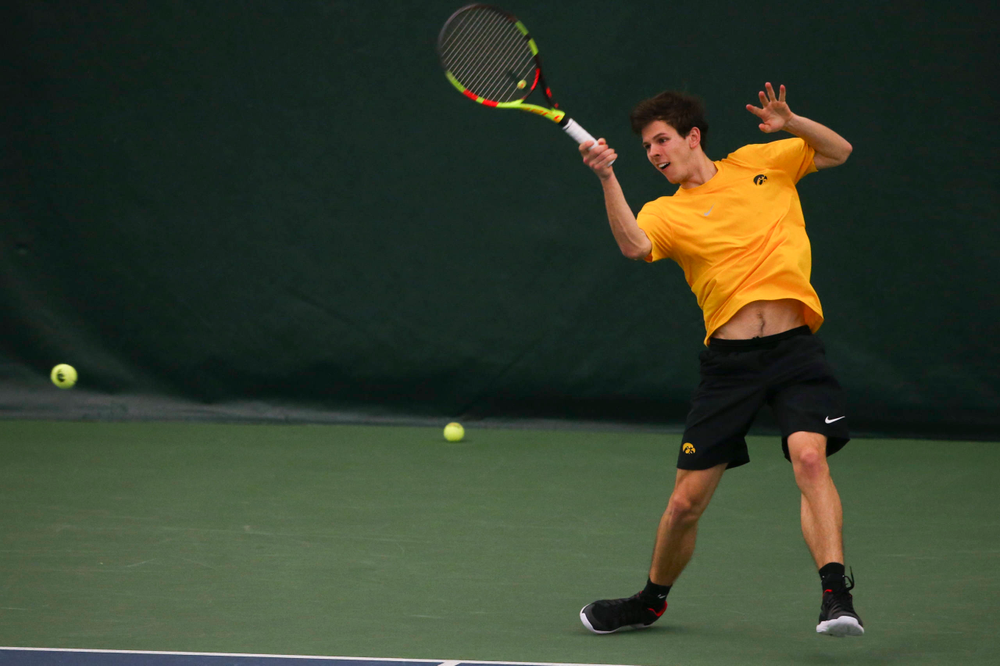 Iowa's Joe Tyler at a tennis match vs Drake Friday, March 8, 2019 at the Hawkeye Tennis and Recreation Complex. (Lily Smith/hawkeyesports.com)
