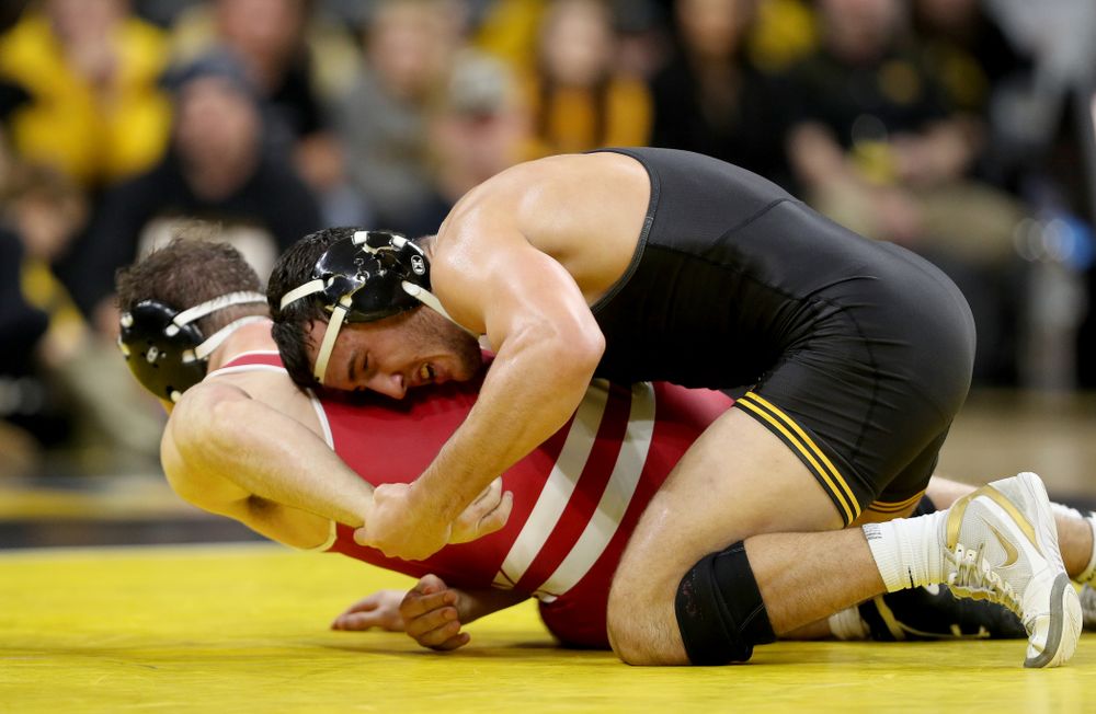 IowaÕs Michael Kemerer wrestles WisconsinÕs Jared Krattinger at 174 pounds Sunday, December 1, 2019 at Carver-Hawkeye Arena. Kemerer won the match with a fall. (Brian Ray/hawkeyesports.com)