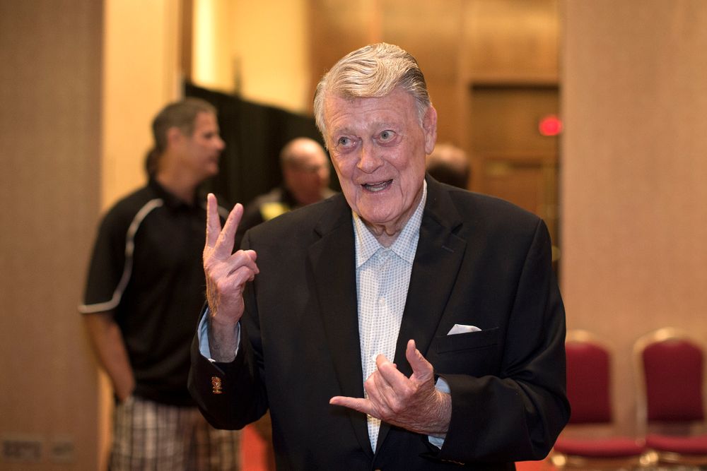 Former Hawkeye Football Head Coach Hayden Fry tells a story before a panel discussion with former quarterback Chuck Long during a panel discussion at Fry Fest Friday, Aug. 29, 2014 in Coralville. (Brian Ray/hawkeyesports.com)