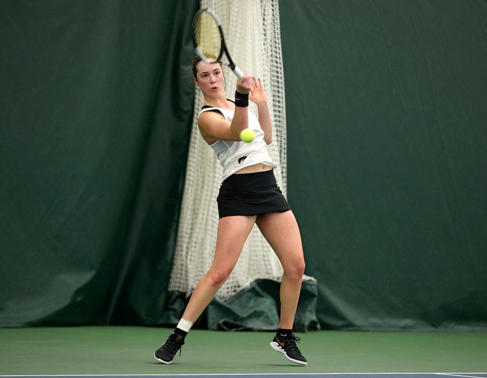 Iowa’s Samantha Mannix returns a shot during her singles match at the Hawkeye Tennis and Recreation Complex in Iowa City on Sunday, February 23, 2020. (Stephen Mally/hawkeyesports.com)